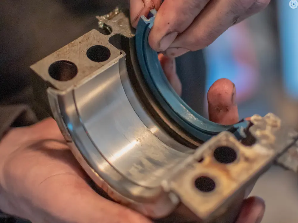 Replace the rear main seal. 